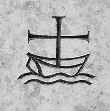 cross in boat on sea b&w.jpg