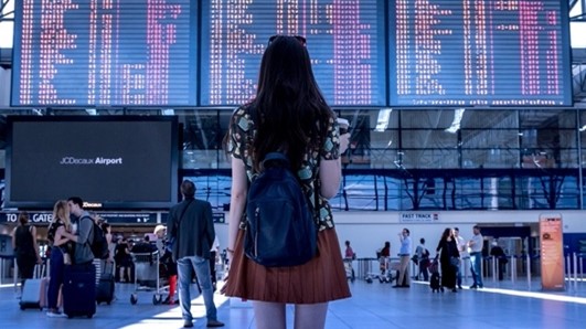 woman looking at destinations.jpg